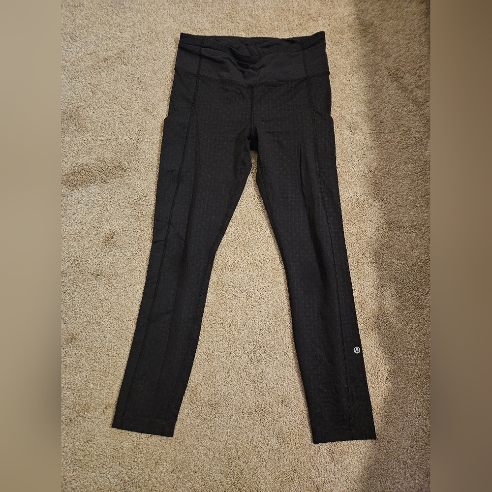 Lululemon High-Waisted Black Leggings with Subtle Print